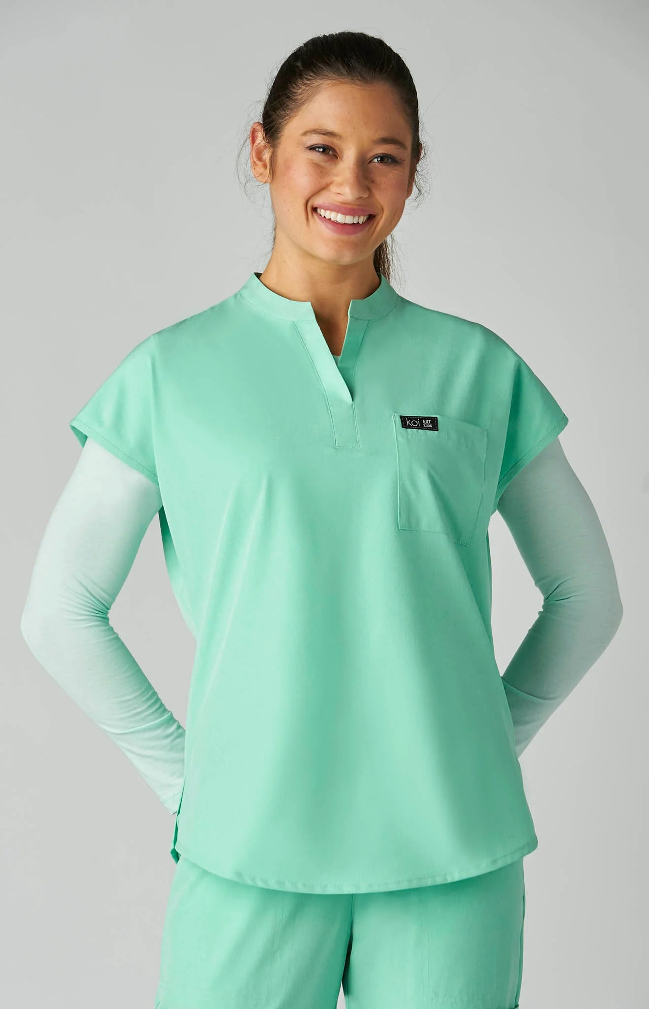 EQUIPO DAMA KOI BASICS ARI VERDE AGUA