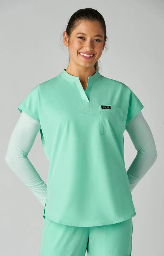 EQUIPO DAMA KOI BASICS ARI VERDE AGUA