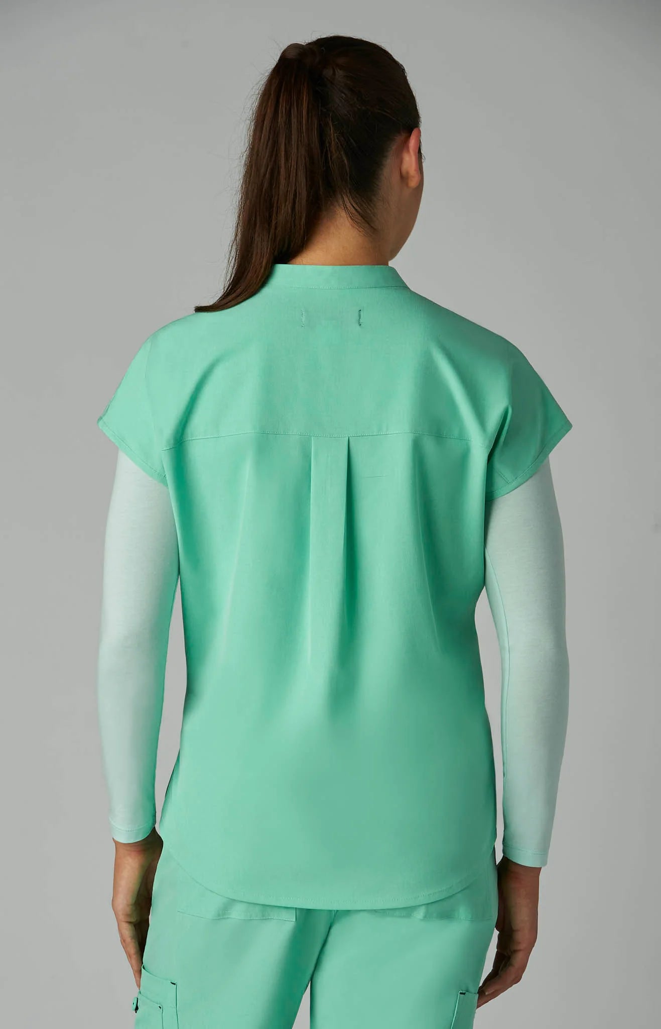 EQUIPO DAMA KOI BASICS ARI VERDE AGUA
