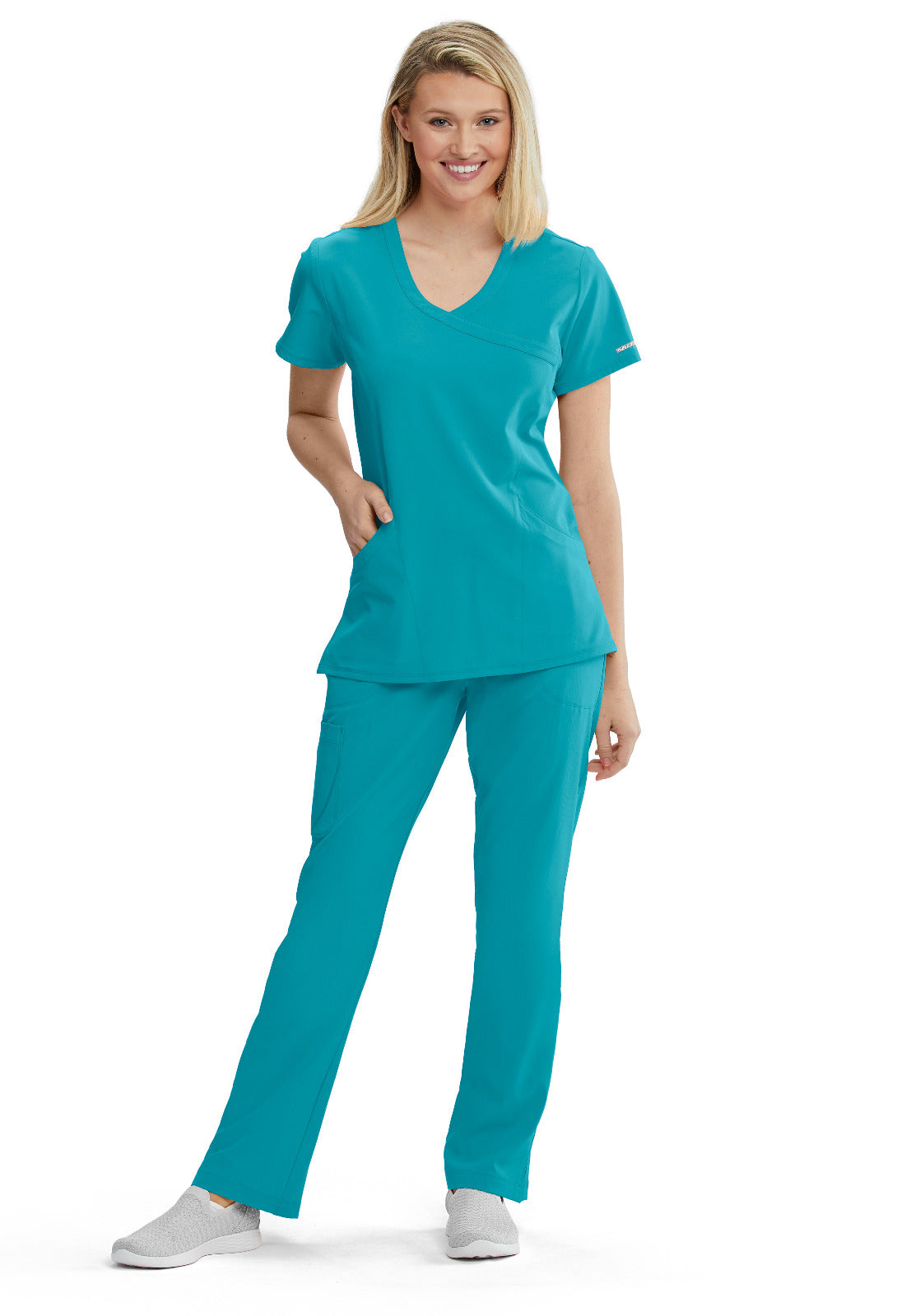EQUIPO DAMA SKECHERS TEAL