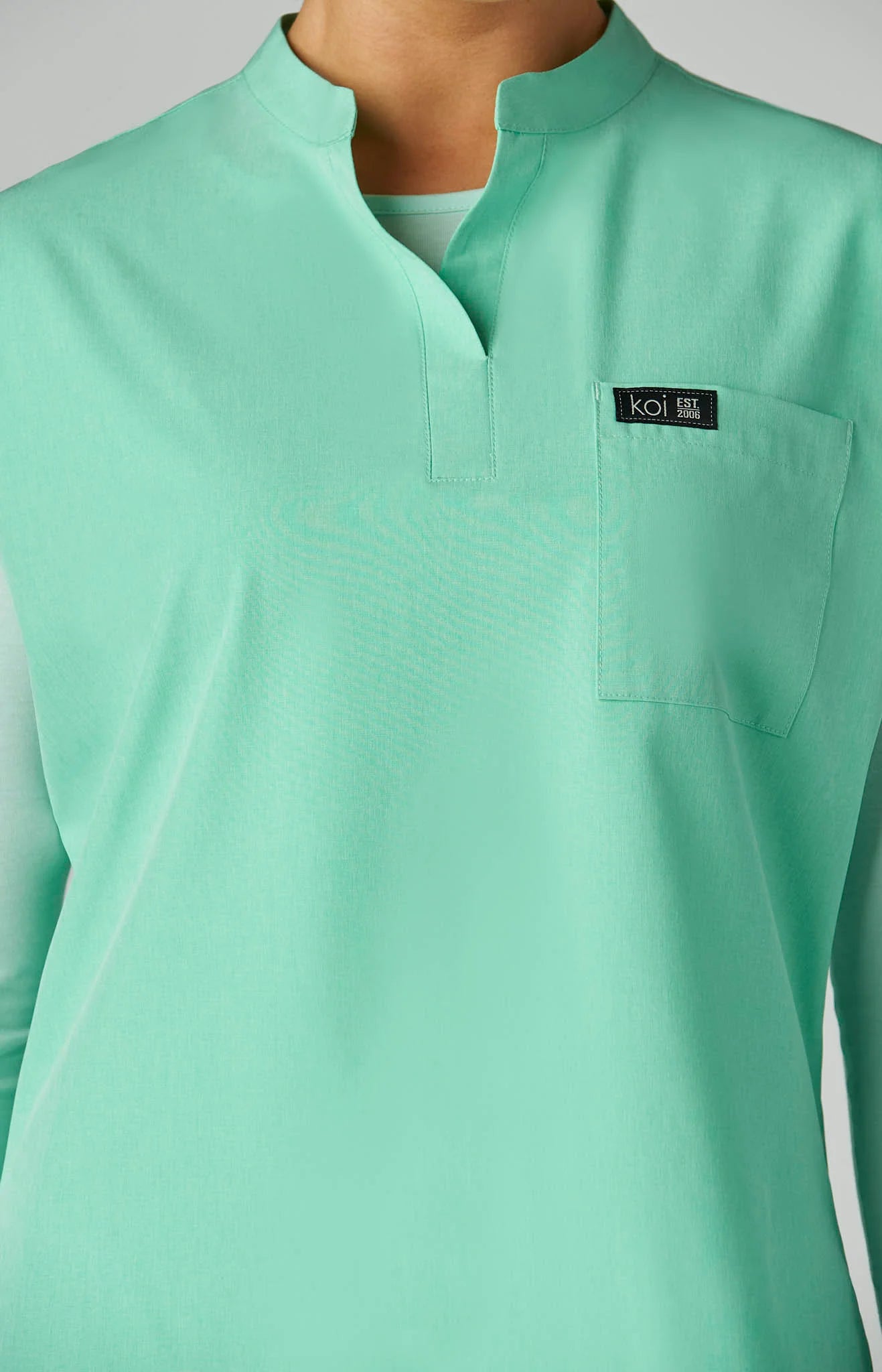 EQUIPO DAMA KOI BASICS ARI VERDE AGUA